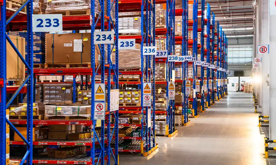 Looking down a row of warehouse aisles