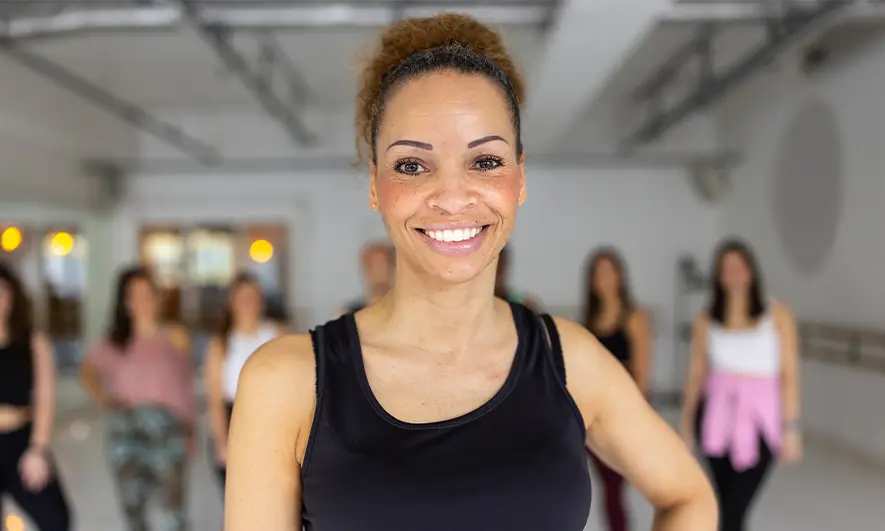female small business owner protected by zumba instructor insurance