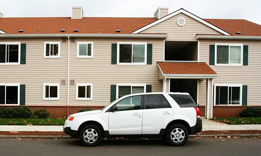 customer protected by car and condo insurance from The Hartford