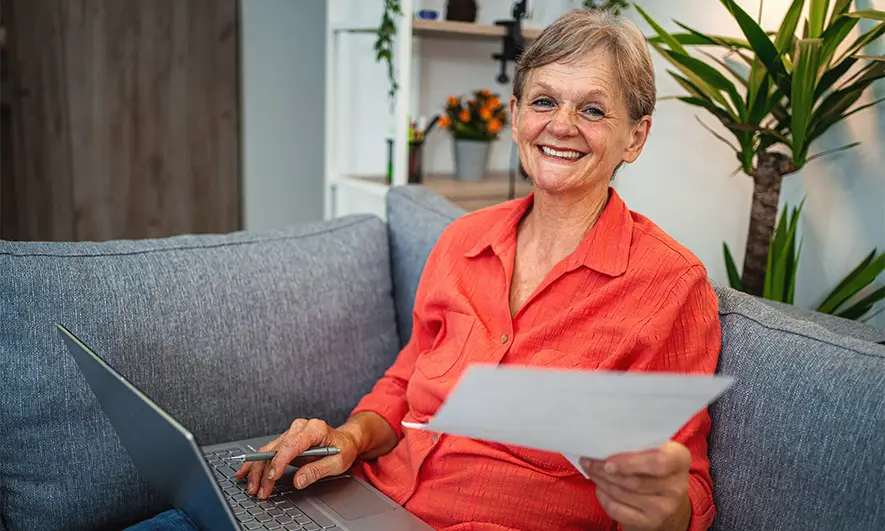 woman happy with car insurance quotes comparison