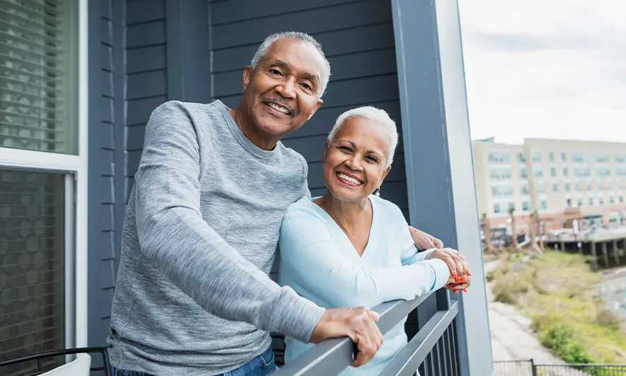 couple protected by knowing condo insurance costs