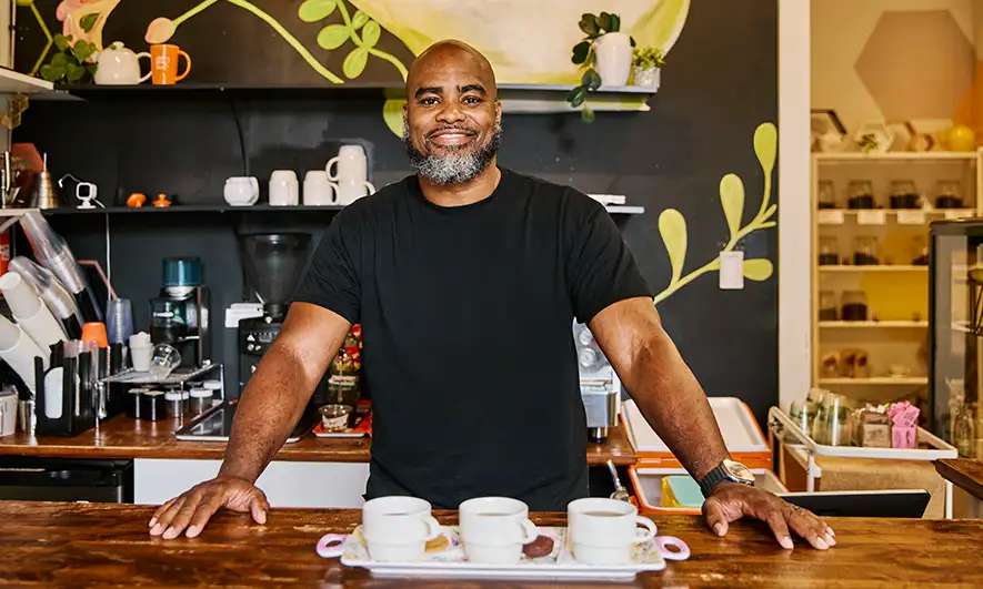 small business owner happy to understand how to get liability insurance