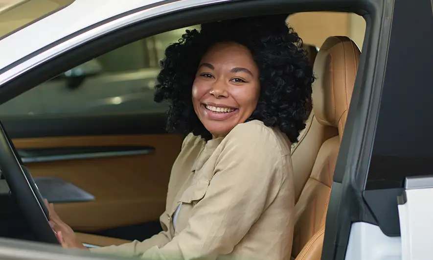 woman pleased with insuring leased cars