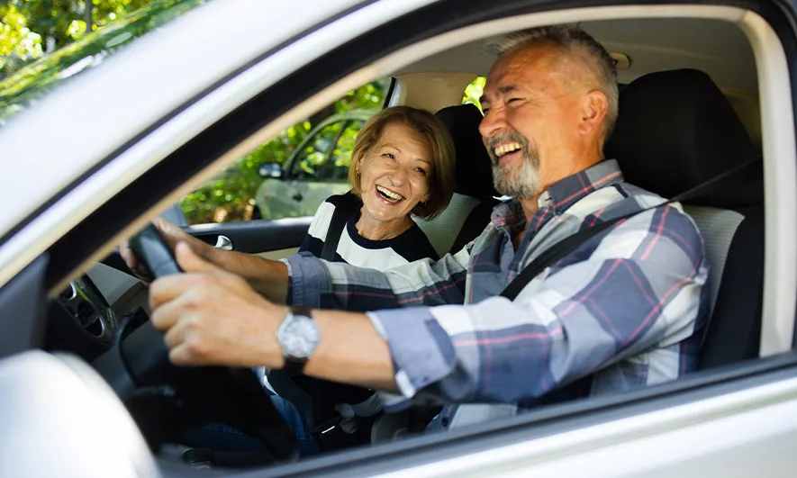 couple pleased with knowing the answer to the question is Car Insurance cheaper as you get older