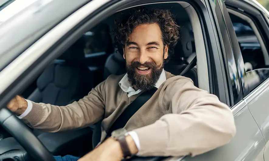 man pleased with physical damage insurance from The Hartford