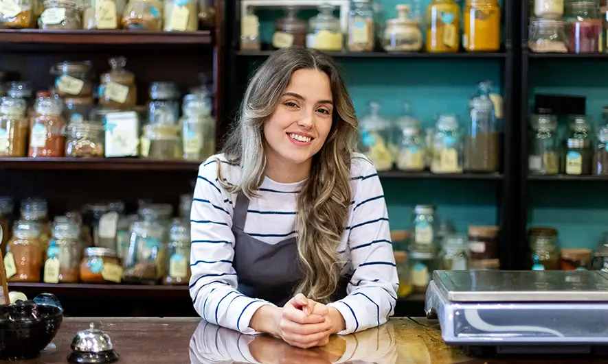 small business owner happy The Hartford is Ranked Top Digital Small Business Insurance Company