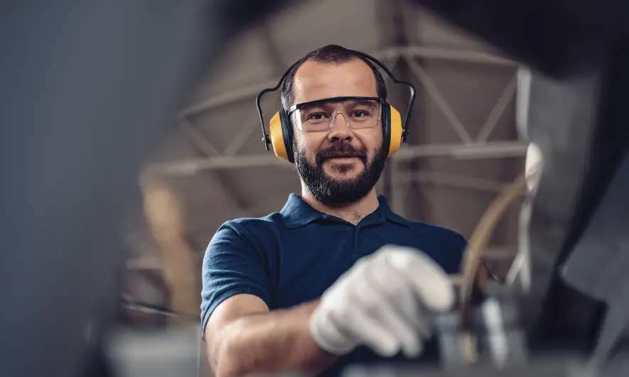 male small business owner feels secure understanding workplace safety and insurance