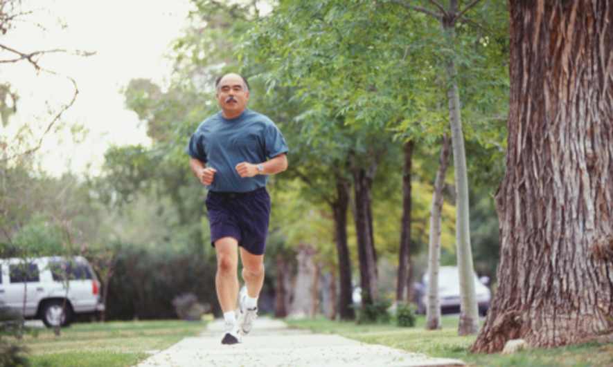 Man Jogging In Park