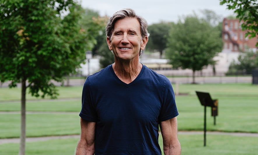 a happy customer with auto insurance from The Hartford