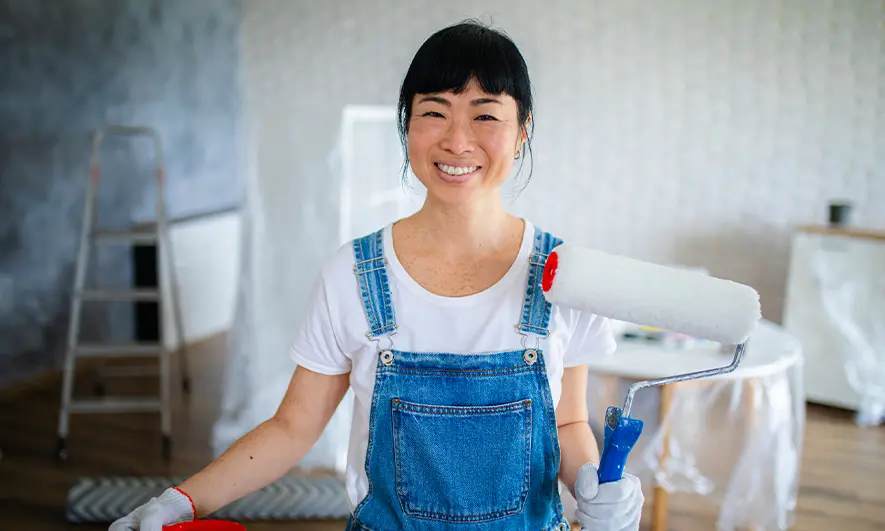 Homeowners inside their home enjoying AARP Homeowners Insurance benefits