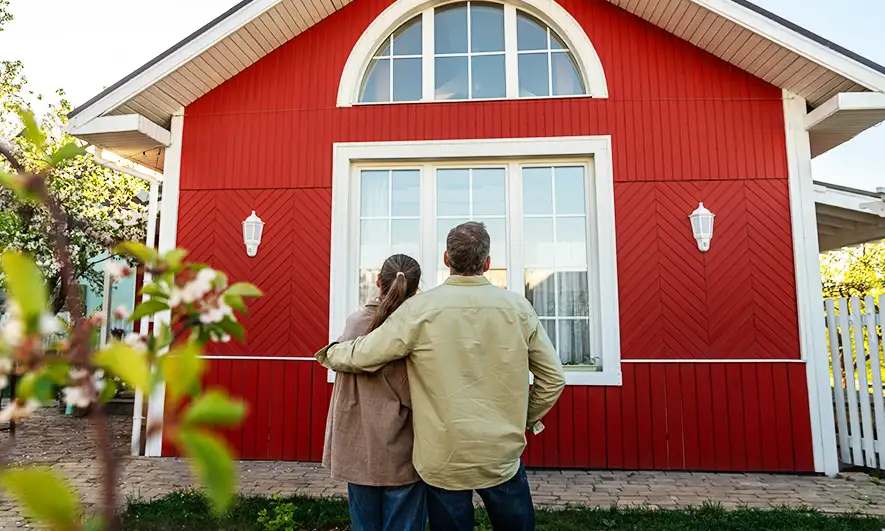 couple enjoys their home after getting an aarp homeowners insurance quote
