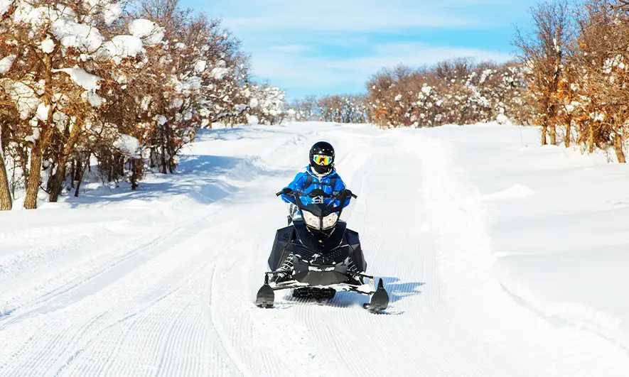 customer protected by affordable snowmobile insurance