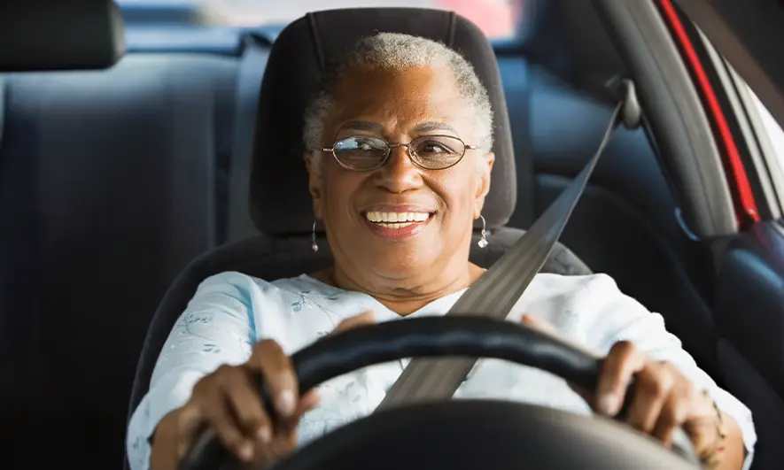 female driver protected by auto insurance medical payments from The Hartford