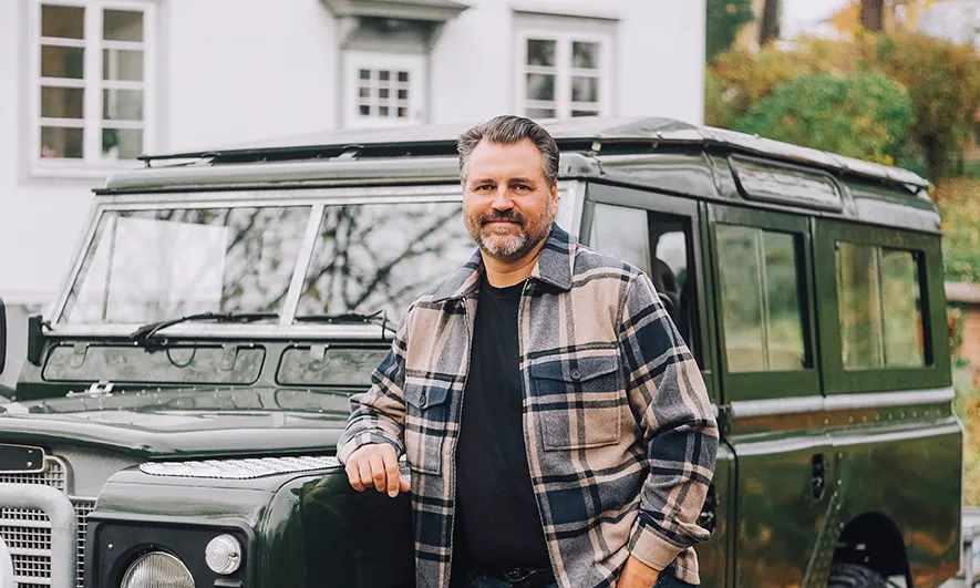 man happy to bundle home and auto insurance