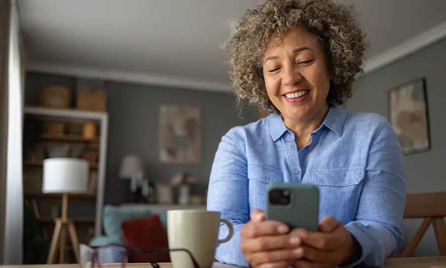 female customer happy after getting car insurance coverage in chicago