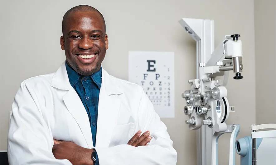 male small business owner happy to easily get coi for optometrists