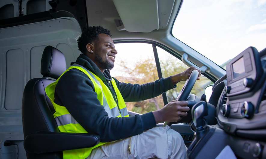 small business owner enjoying their job knowing they have great commercial auto insurance rates from The Hartford