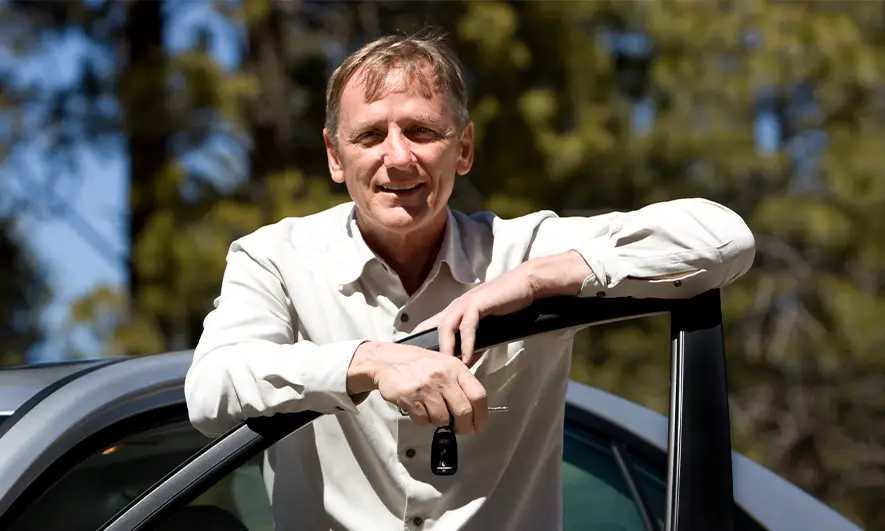 man happy he could compare car insurance