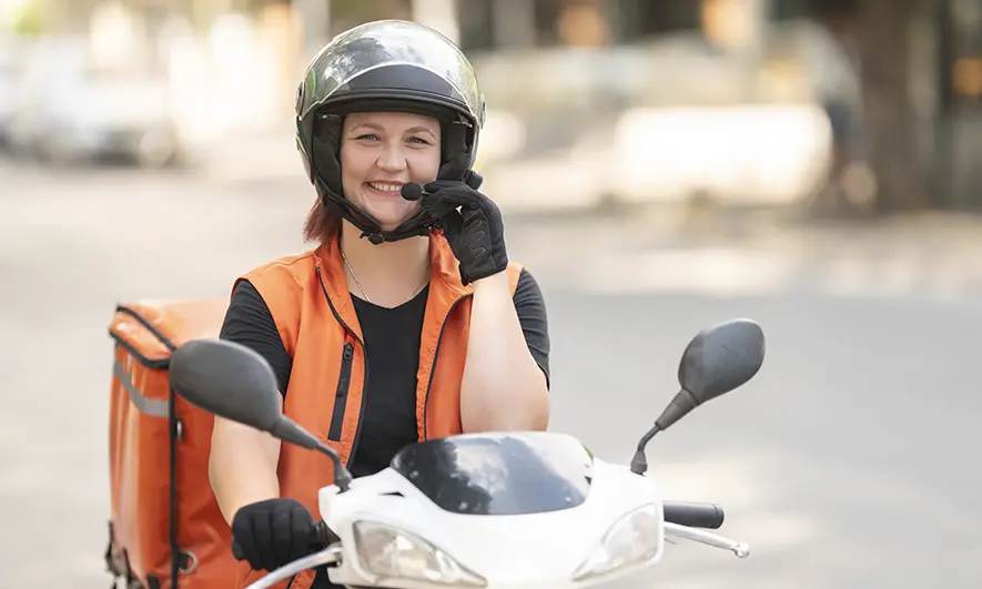 small business owner protected by courier motorbike insurance