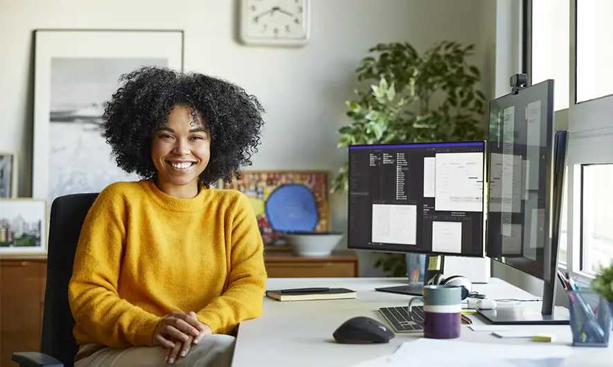 business owner happy to do her job after getting data scientist insurance quote