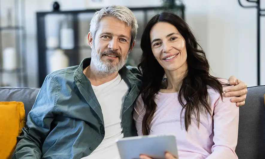 couple pleased with their deductible for homeowners insurance from The Hartford