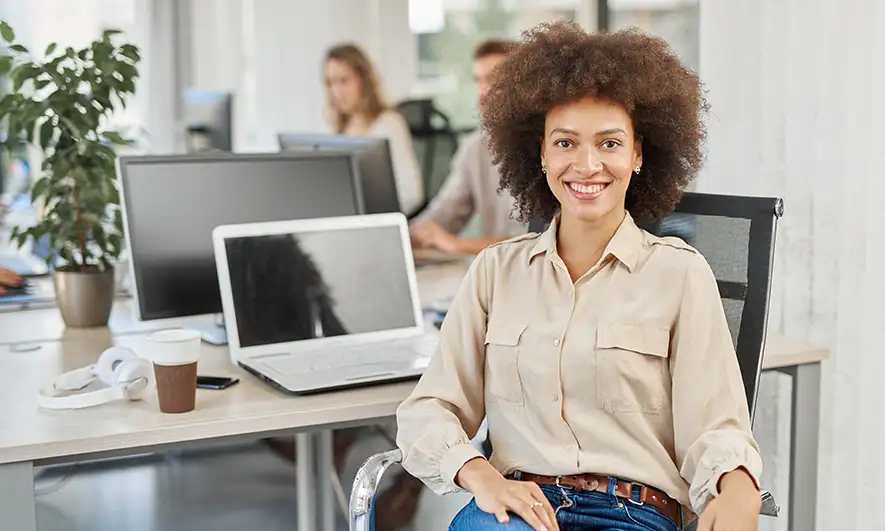 female small business owner happy to have digital marketing agency insurance