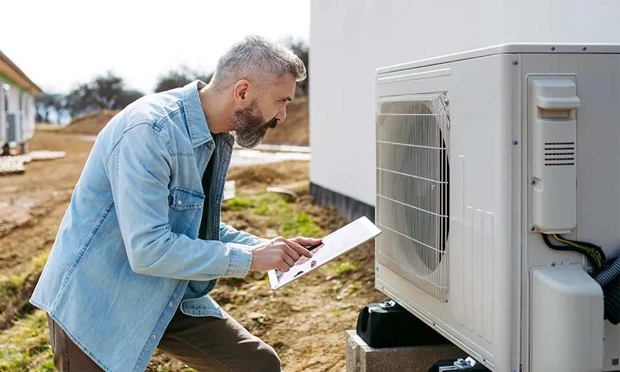male homeowner protected by knowing does home insurance cover HVAC?