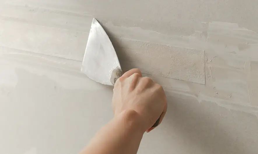 business owner works worry-free after getting a drywall contractor insurance quote