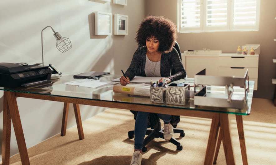 woman thinks about an errors and omissions insurance policy for her small business
