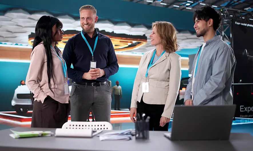 business owners happy to do their jobs after getting exhibitor insurance