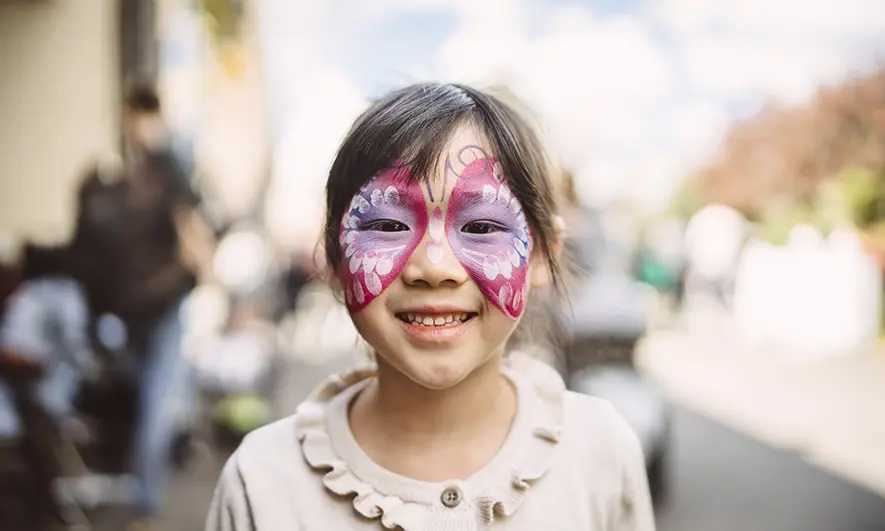 happy customer for business owner who got face paint insurance