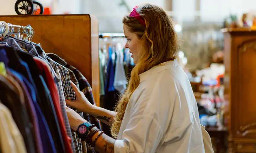 business owner enjoying work after getting a flea market insurance quote