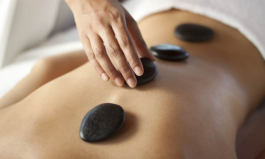 a hot stone massage which can leave burns and create a liability for your business