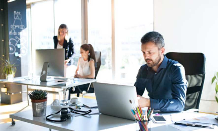 small business owner enjoying their job knowing business tax due date
