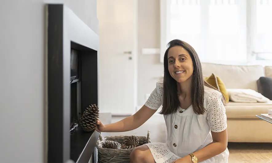 female business owner happily works after getting home staging insurance quote