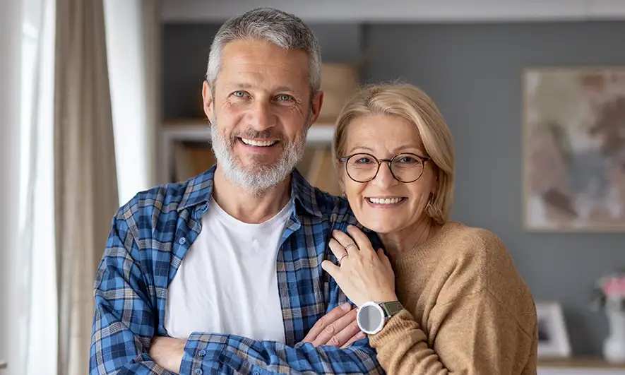 couple happy knowing homeowners insurance prices