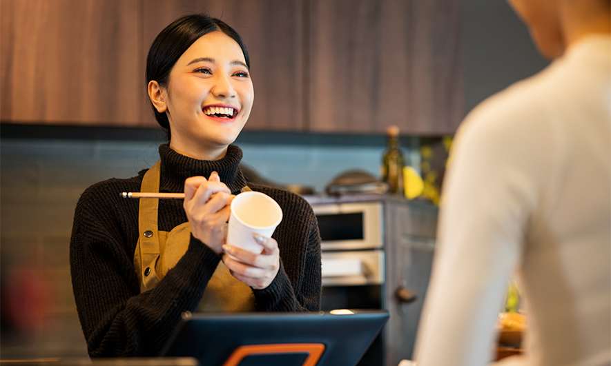 small business owner shopping online for Insurance for coffee shop