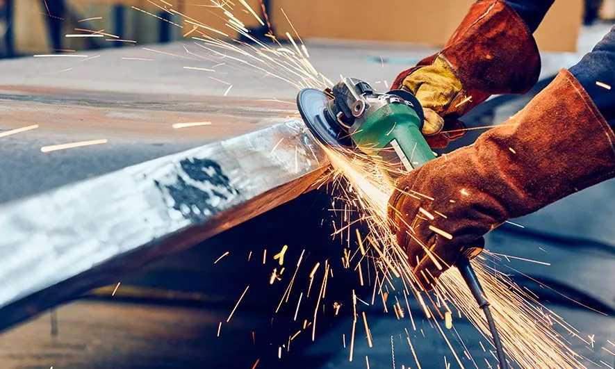 small business owner protected by insurance for machine shops