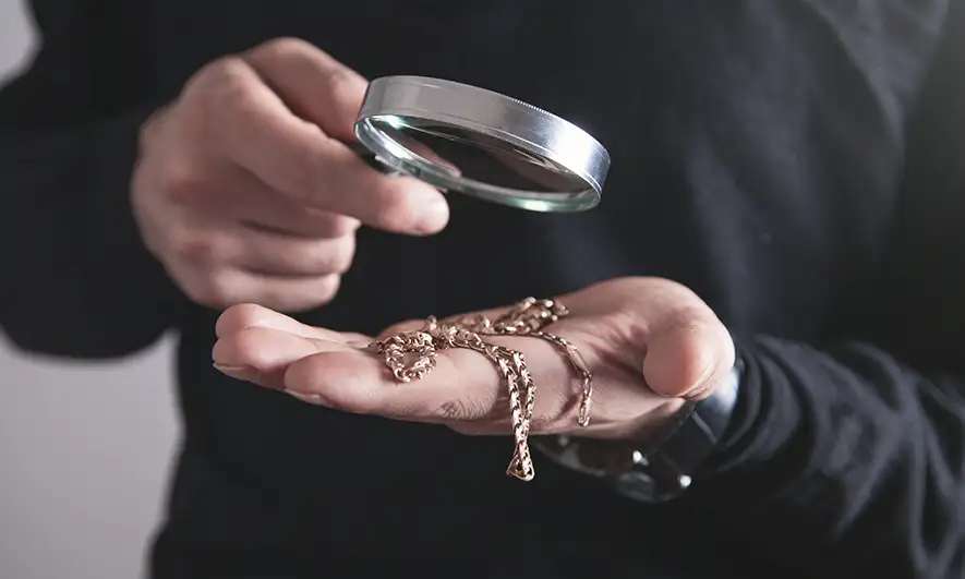 small business owner feels secure with insurance for pawnbrokers