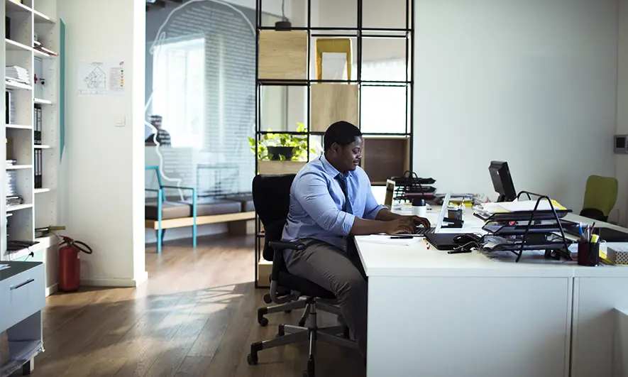 male small business owner protected by insurance for private investigators