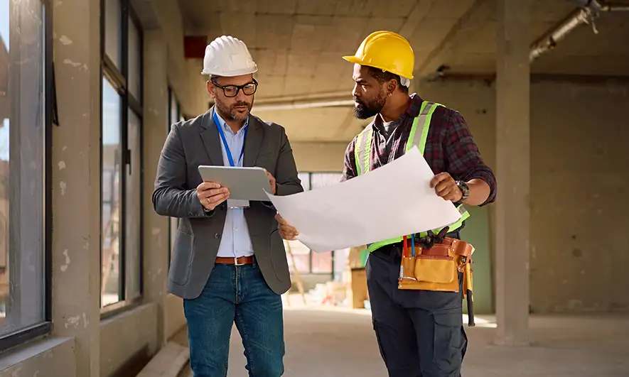 business owners happy to do their jobs after getting insurance for project_managers