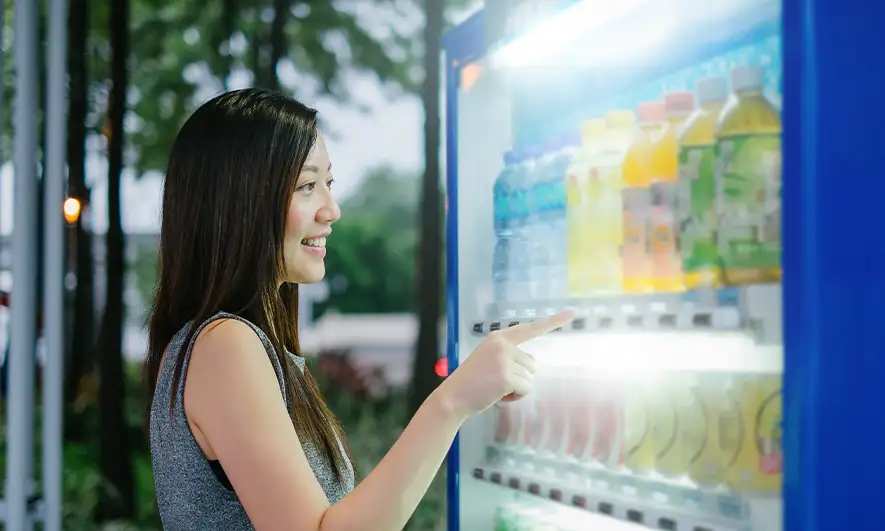 small business owner protected by insurance for vending machine businesses