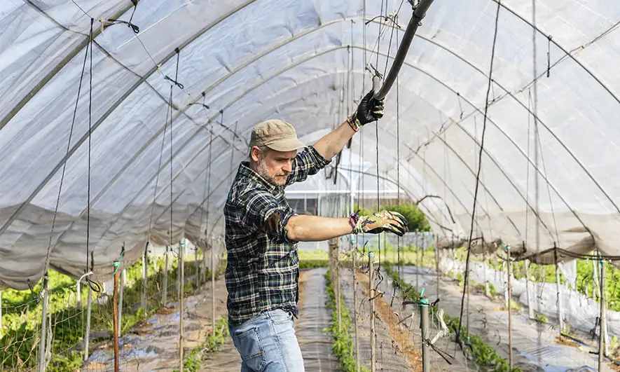 small business owner protected by irrigation business insurance