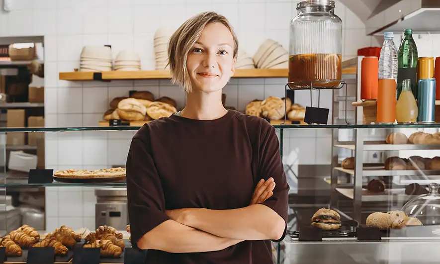 business owner happy being protected with limited liability companies insurance