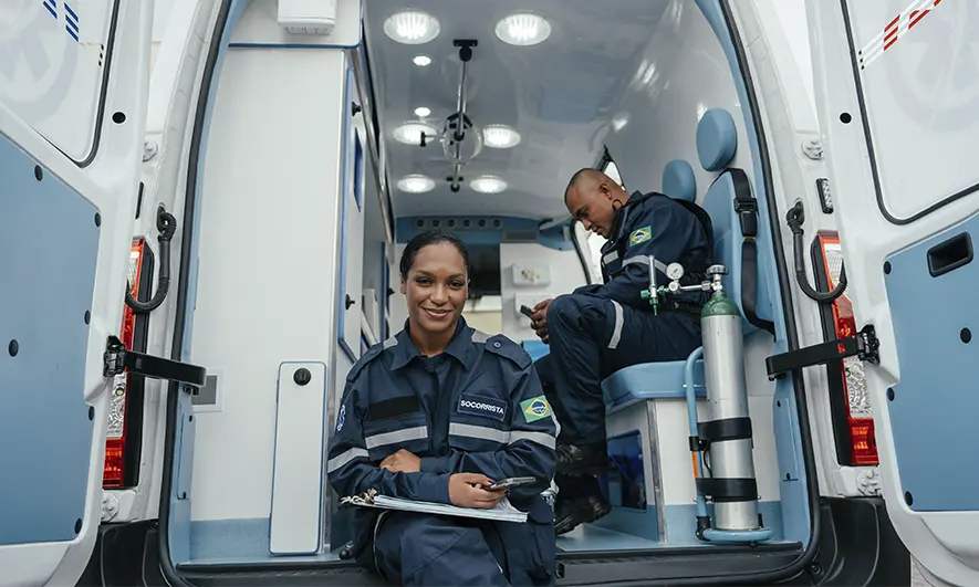 business owner happily does her job after getting a paramedic liability insurance quote