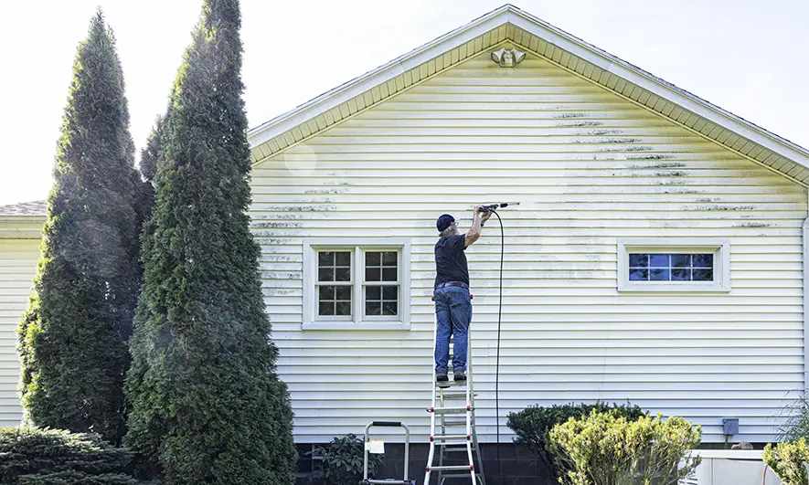 small business owner protected by pressure washing company insurance