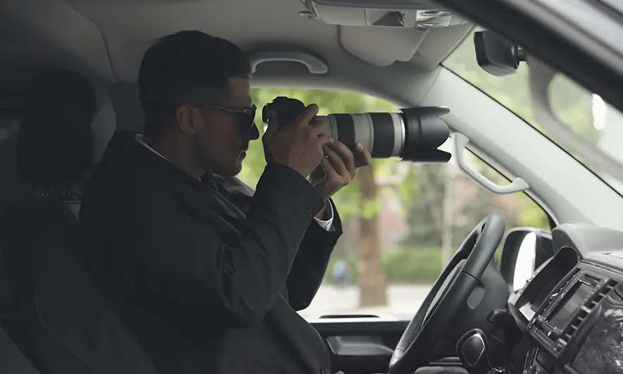 business owner happy to do his job after getting a private detective insurance quote
