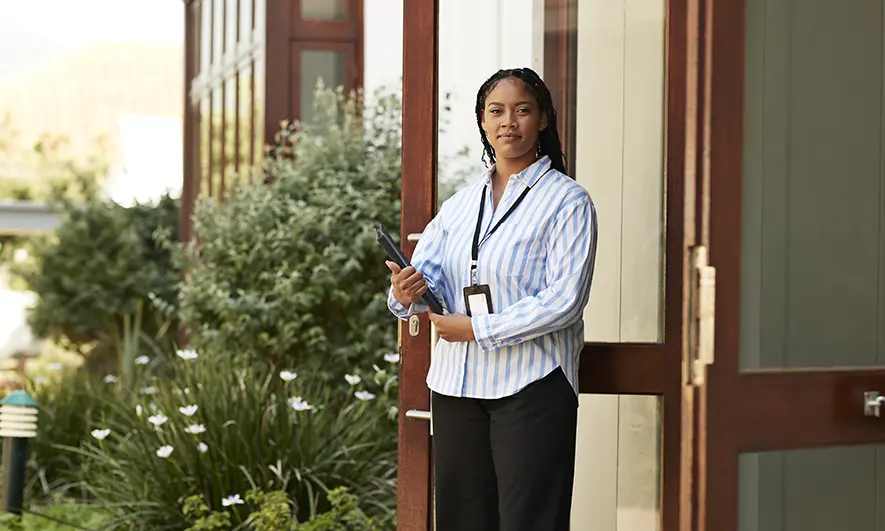 business owner happy to do her job after getting process server insurance quote