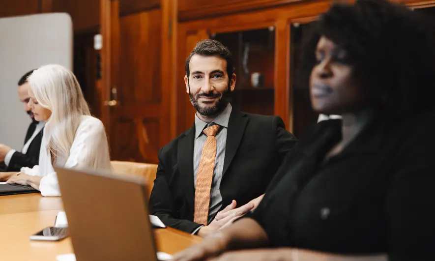 business owner happy to do his job after getting professional malpractice insurance for lawyers