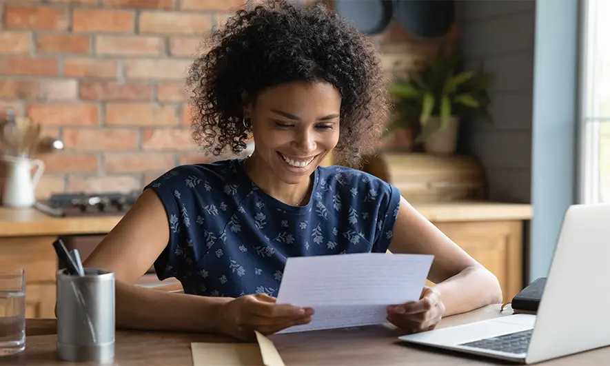 small business owner happy to get proof of podcast insurance